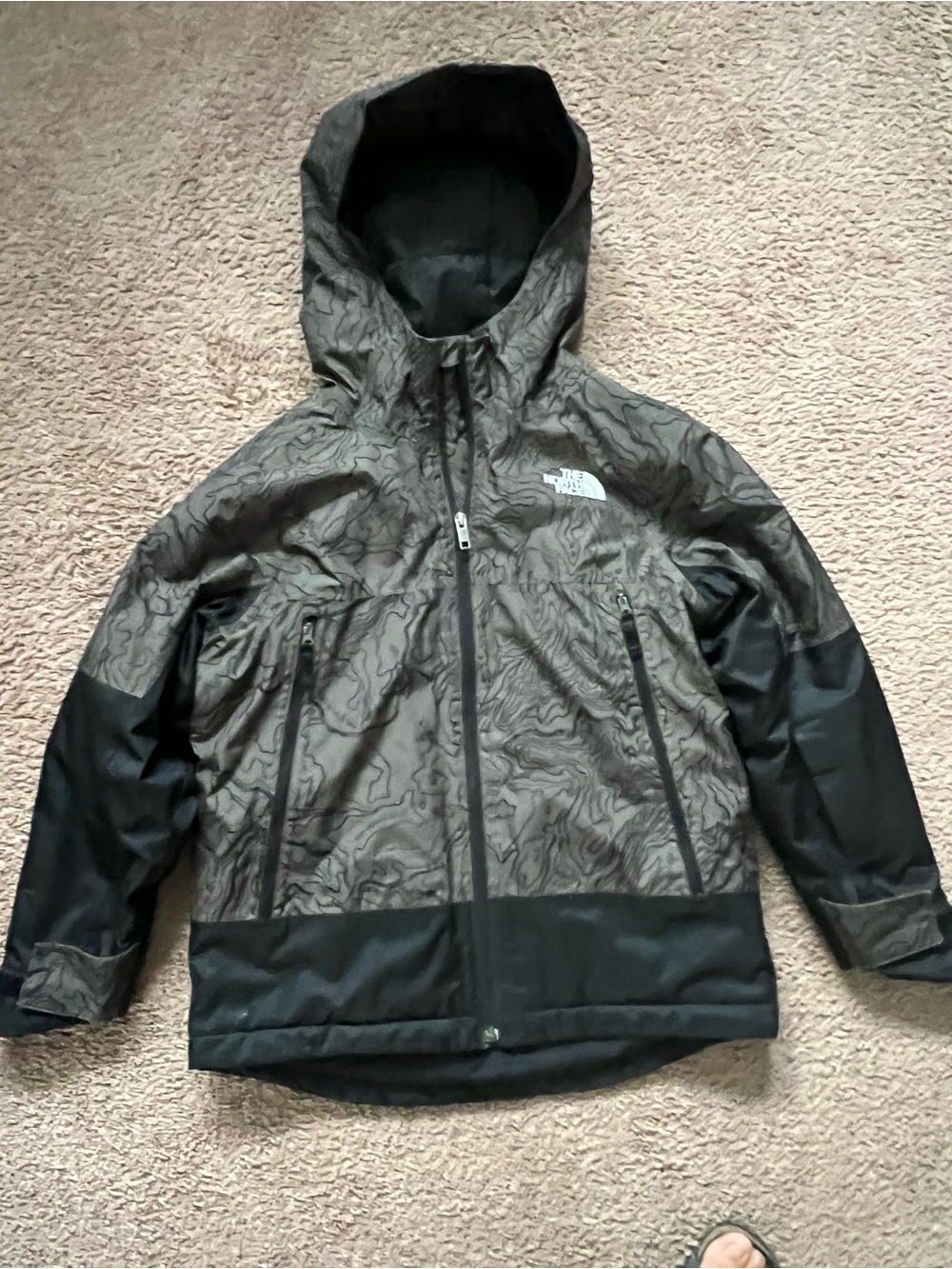 The North Face boys Hooded Rain Jacket in Olive Green and Black